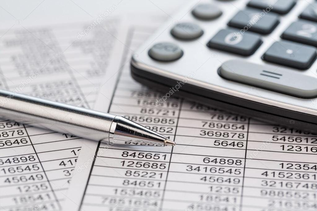 depositphotos_101778510-stock-photo-calculators-and-statistk